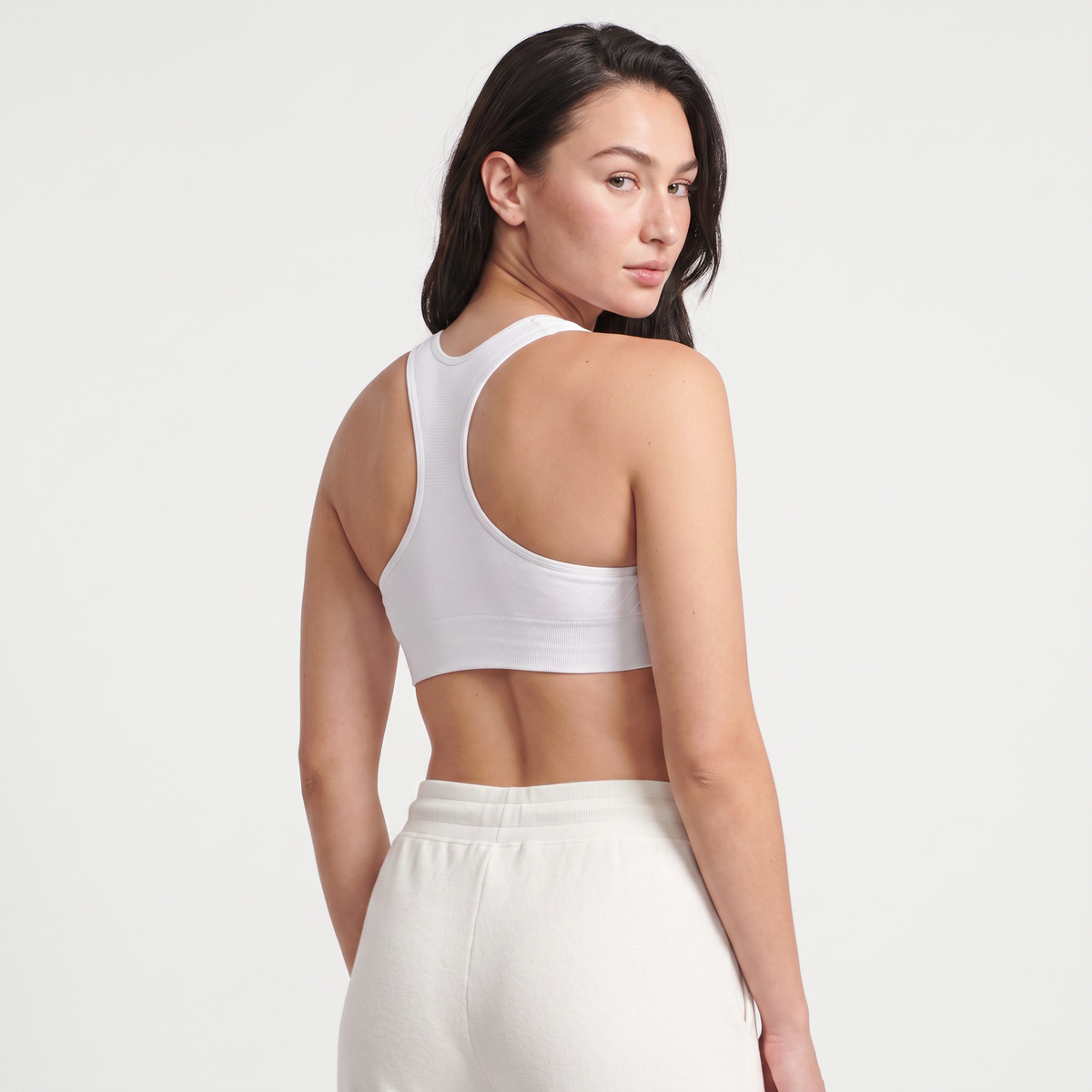 The Seamless Sewn-In Pads Sports Bra — back, T-back strap detail, White