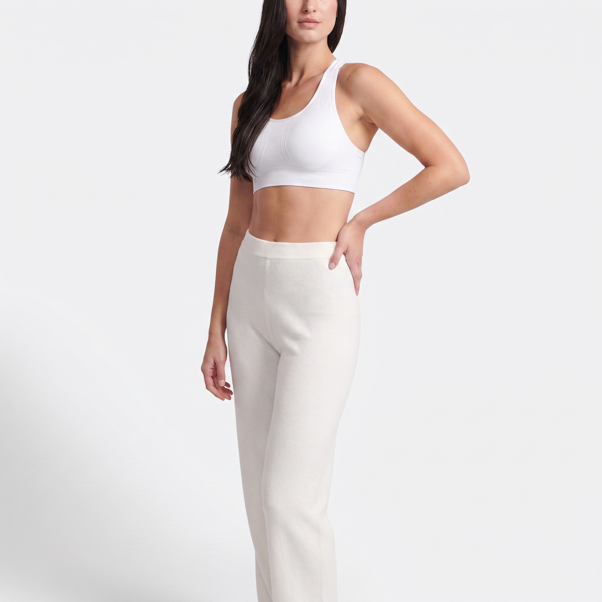 The Seamless Sewn-In Pads Sports Bra — full-length front, White