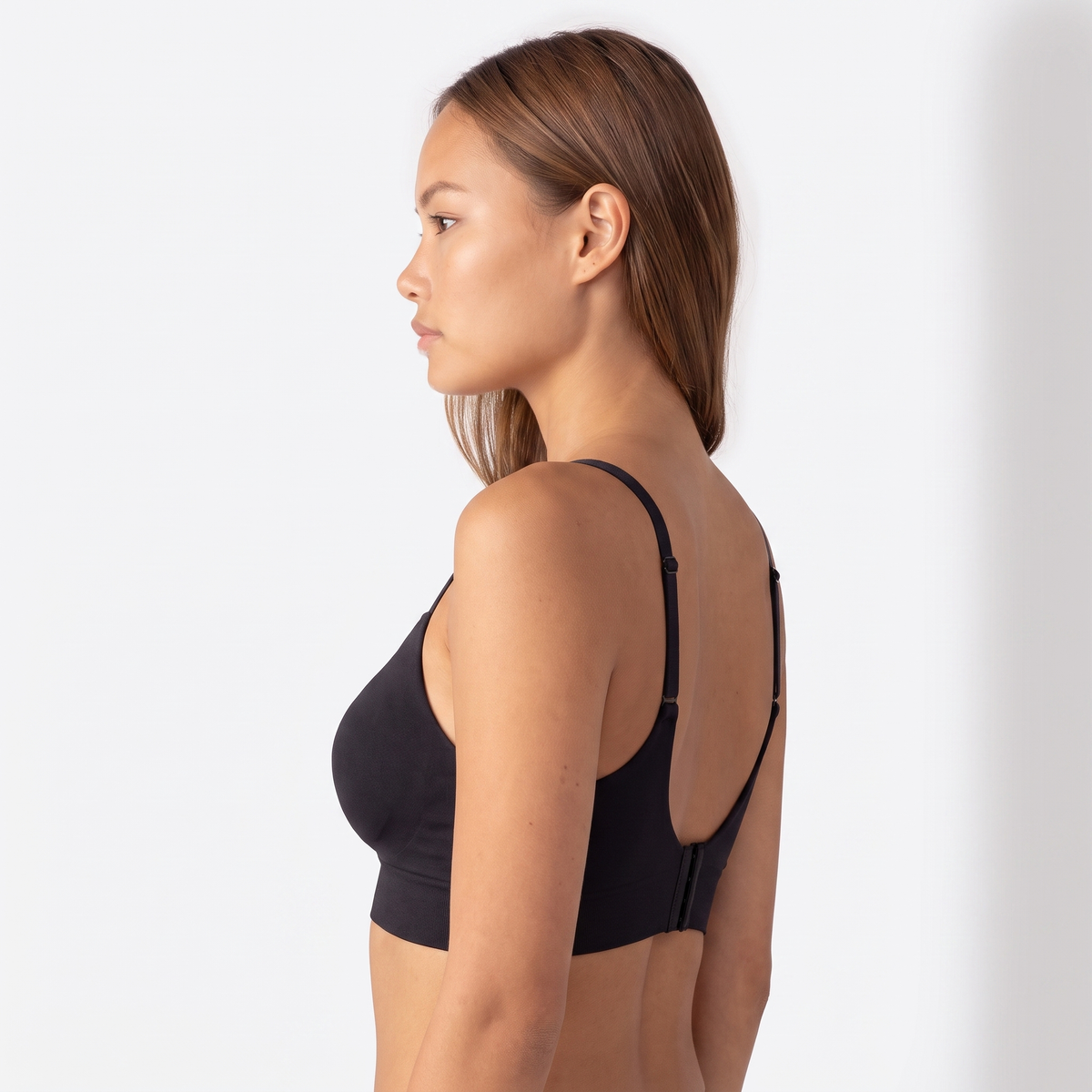 The Wireless V-Neck Shaping Bra — side profile, Black
