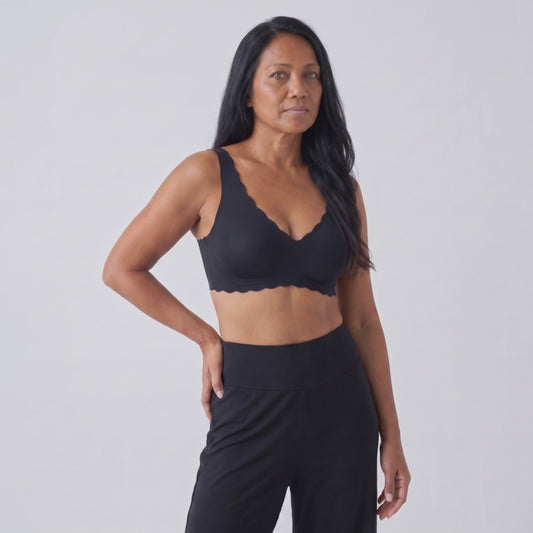 The Scalloped Deep V QuietFrame Bra on model